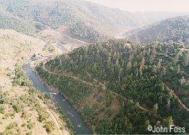 Downview of Stagecoach trail,
		from bridge